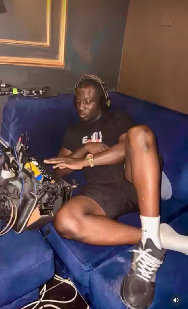Habib on set with equipment